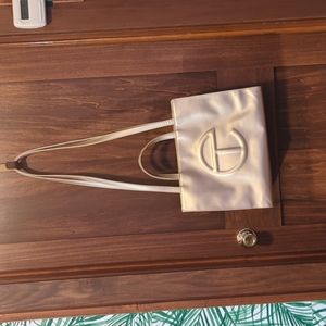 Telfar medium gold shopping bag